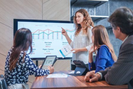 Group of Business people presenting and brainstorming a modern office meeting room